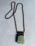 Earthy Transitions: Reversible Ceramic Shard Pendant