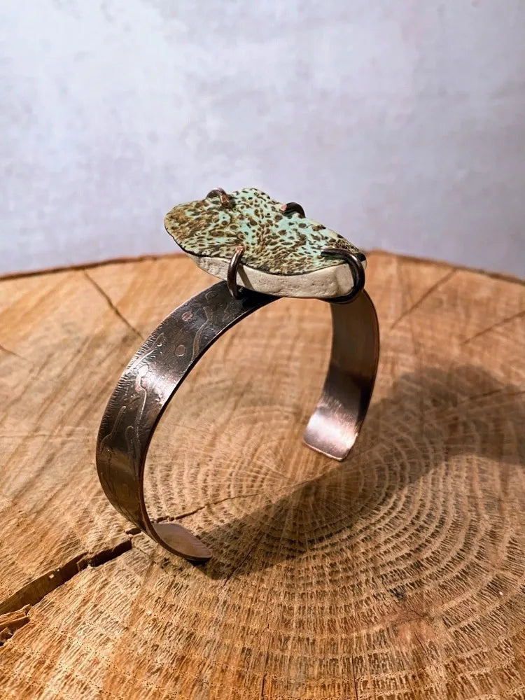 Etched copper cuff with green pottery shard