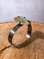 Etched copper cuff with green pottery shard