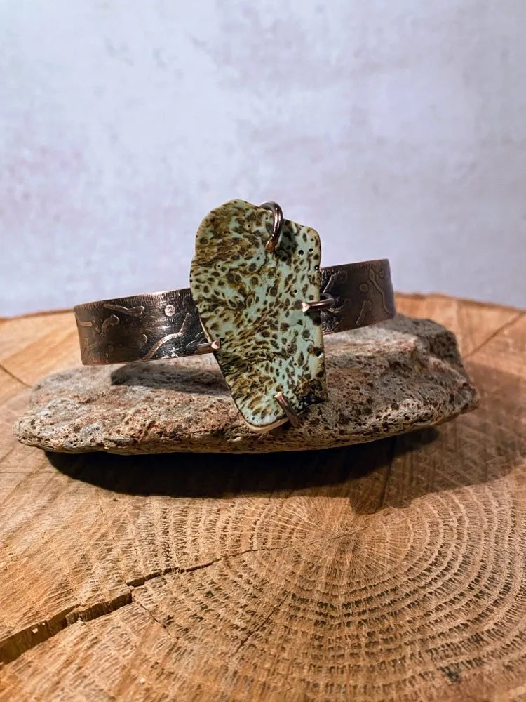 Etched copper cuff with green pottery shard