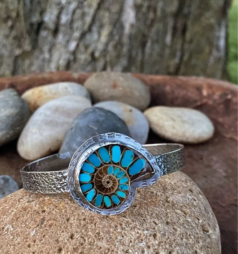 Fossil ammonite with turquoise inlay cuff