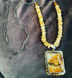 Granilloite and raw beryl with silver link chain. 26”