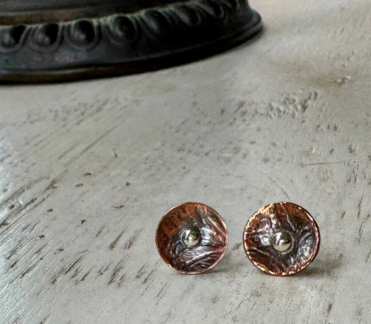 Concave copper stud with silver ball