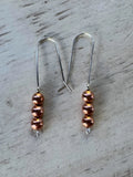 Threader earring with three copper balls